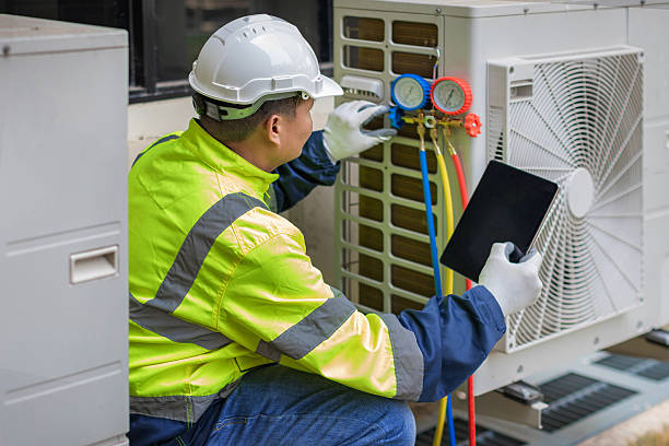 Professional Ac Installation technician working in Bells, TX